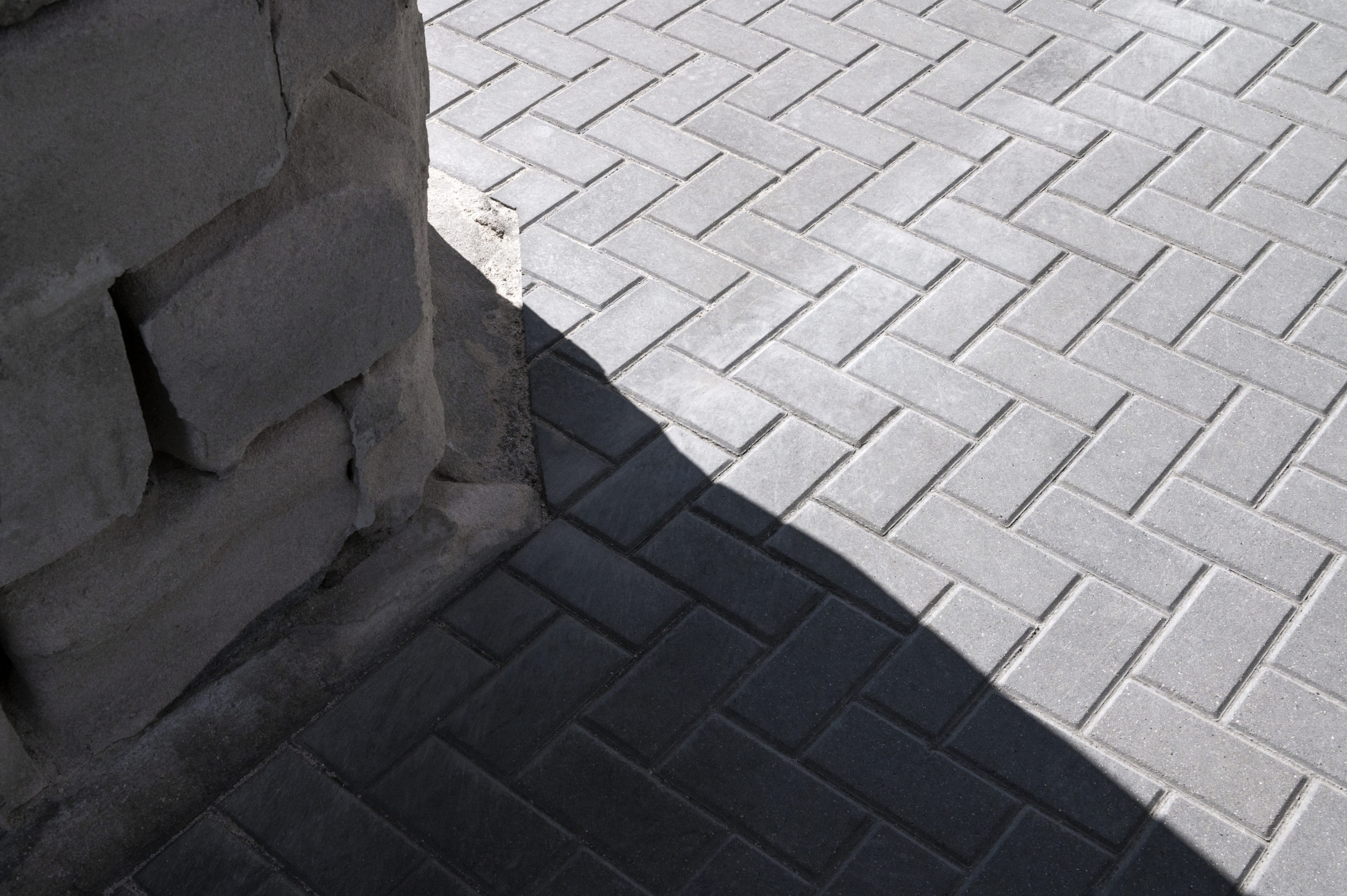 front-view-worker-with-hard-hat-uniform-min Durable patio paving options
