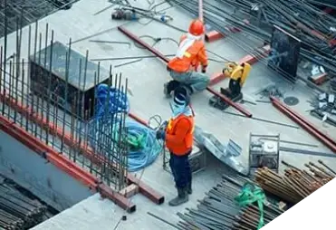 Construction equipment and materials on a job site.
